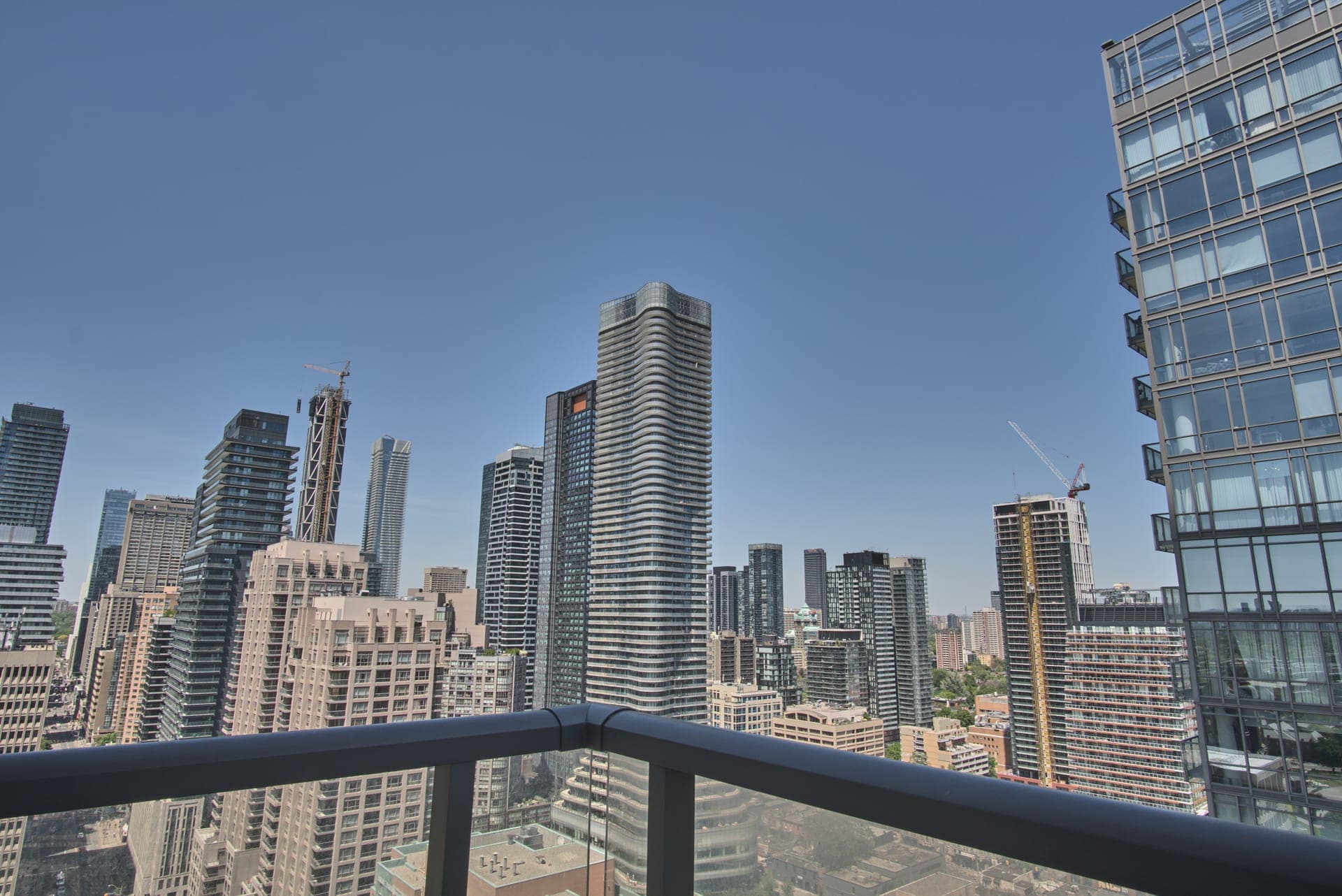Downtown Skyline Condo — Private balcony, 27 storeys up